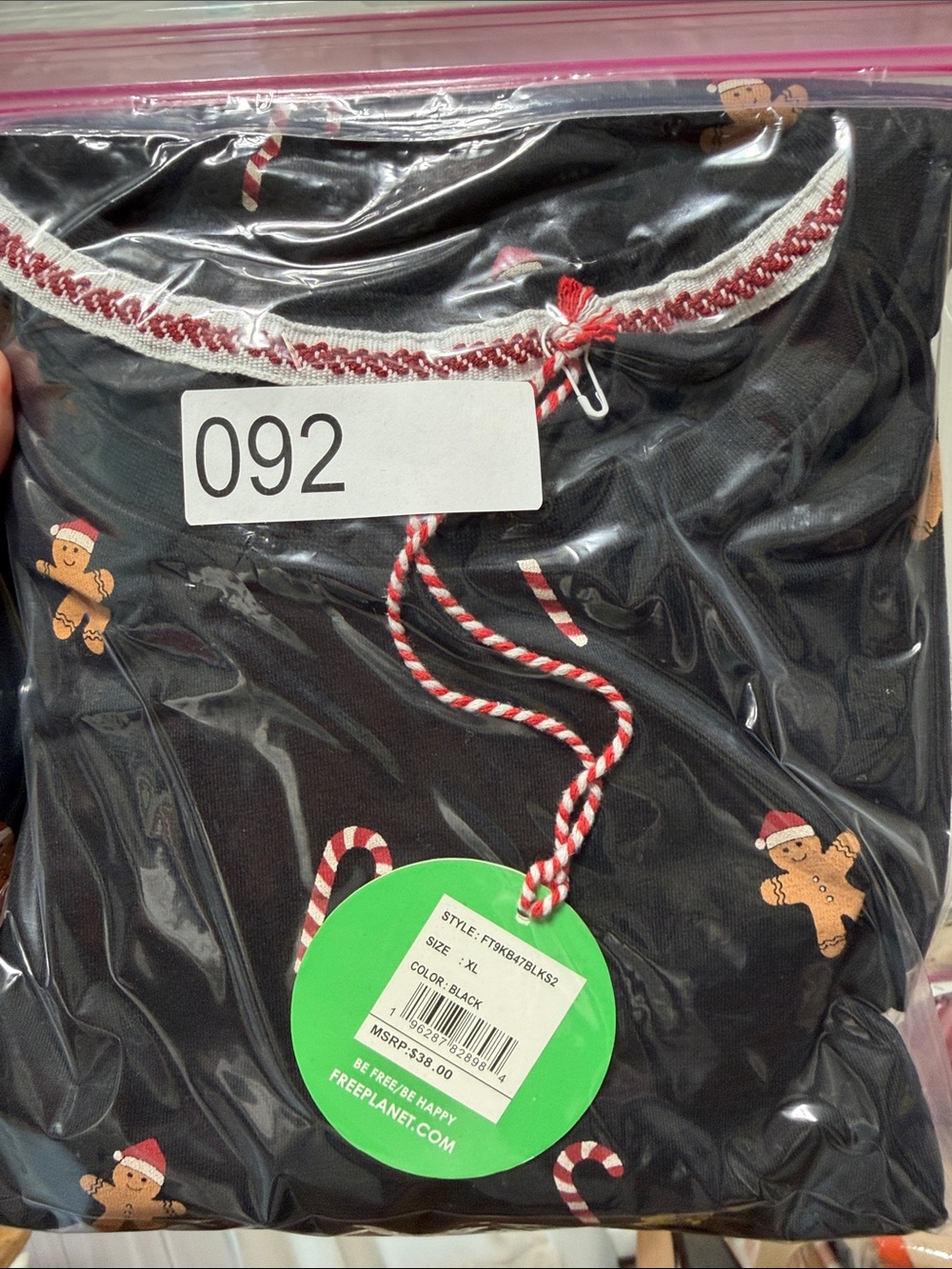 Free Planet Black Tee with Red & White Candy Cane Accents